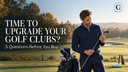 Golfer comparing golf clubs beside a bag at a practice area.